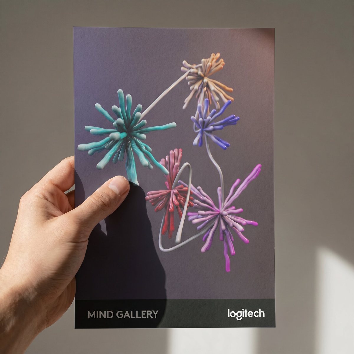 Printed brainwave artwork held in a hand, MX Mind Gallery takeaway