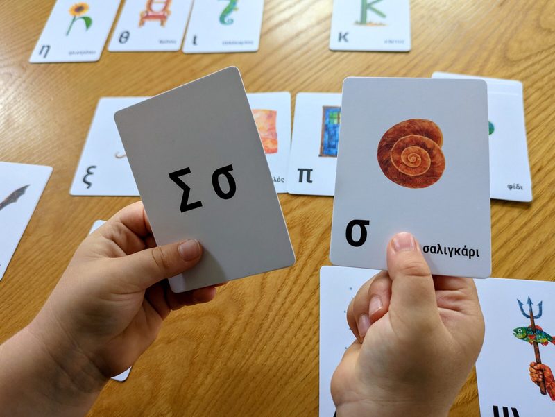 A close-up example showing an object card paired with its corresponding alphabet card
